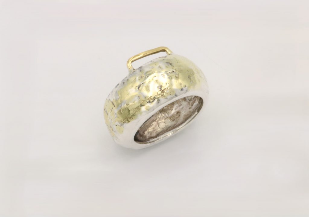 “Out of the ring” Ring, silver and gold