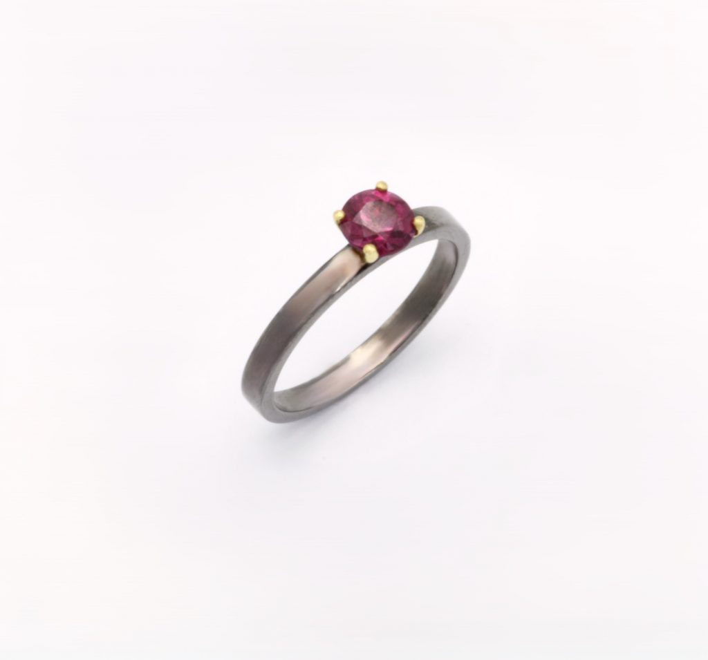 “Solitaire” Ring, silver and gold, ruby